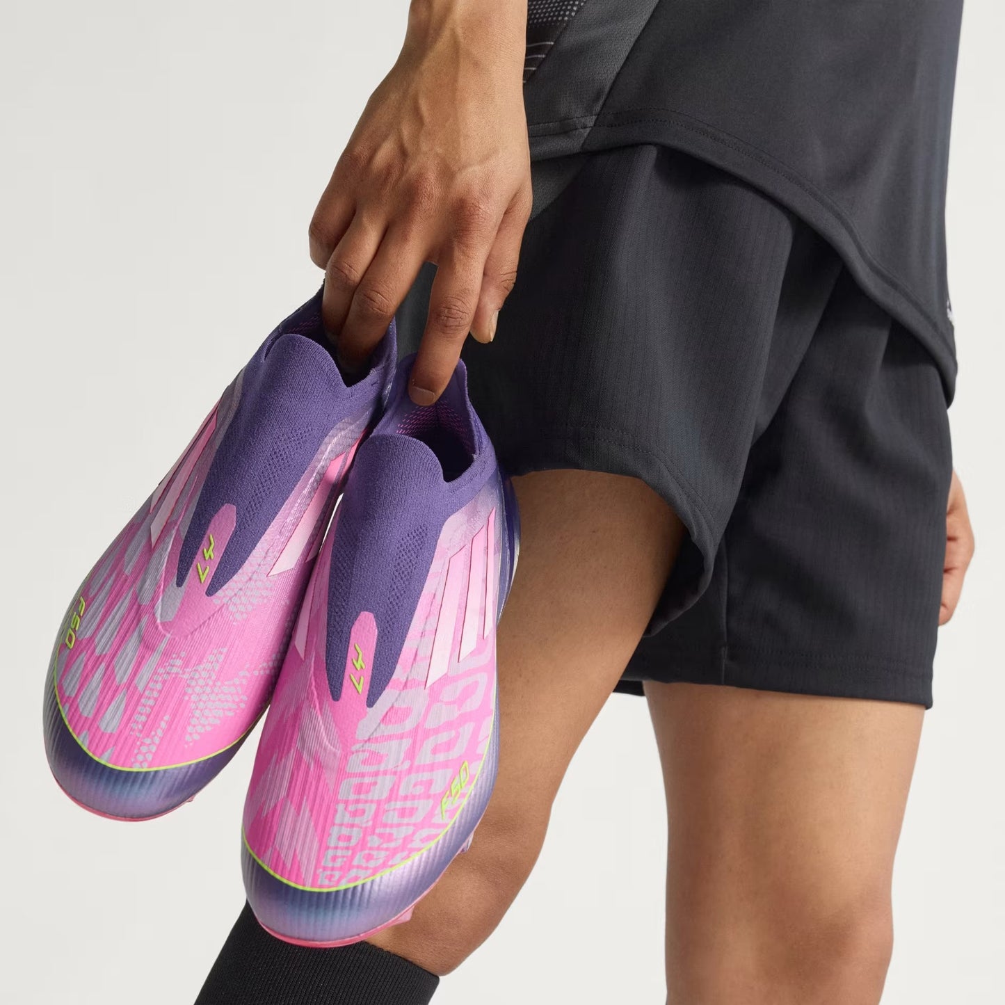 F50 Elite LY Laceless Firm Ground Boots