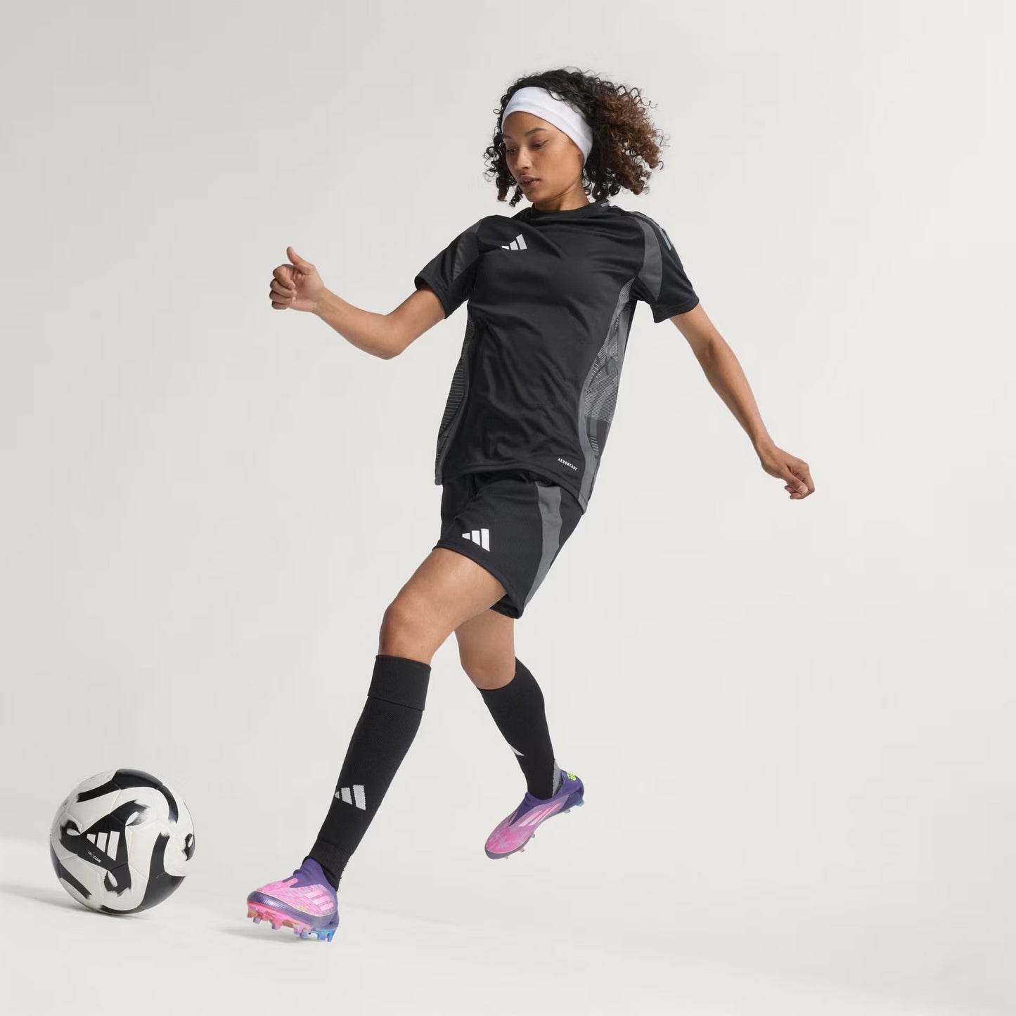 F50 Elite LY Laceless Firm Ground Boots