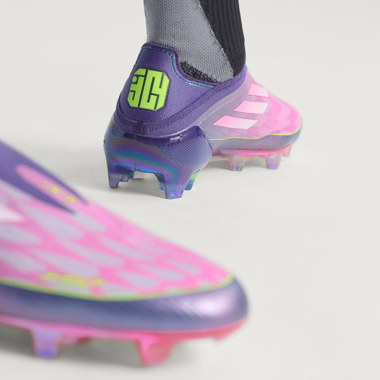 F50 Elite LY Laceless Firm Ground Boots
