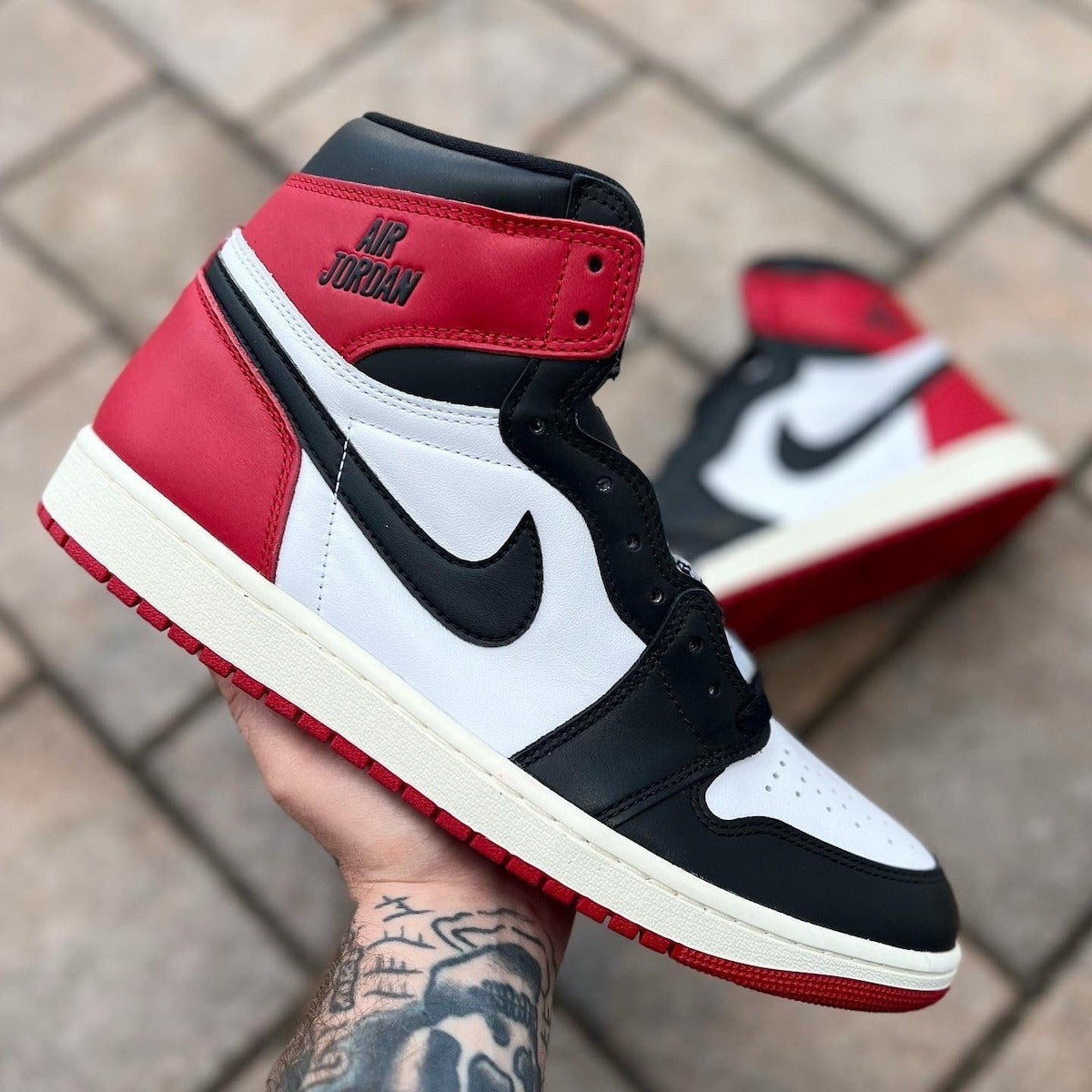 Air Jordan 1 Retro High OG “Black Toe Reimagined
